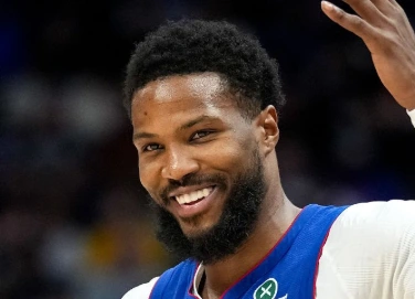 malik beasley during match in 2025